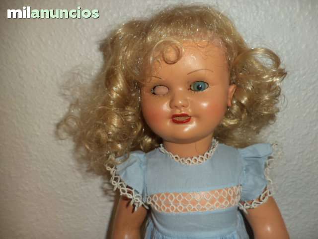 muñeca carton piedra