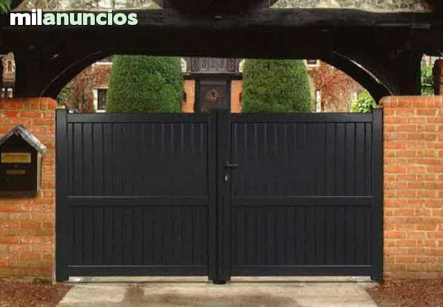 MIL ANUNCIOS.COM - Puerta de garaje abatible de aluminio