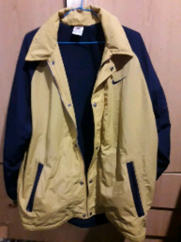 chaquetas nike beige