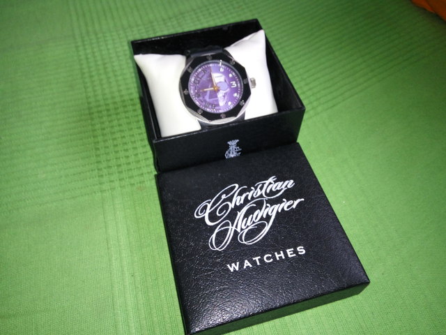 reloj christian audigier