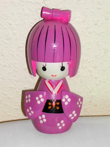 muñecas japonesas de madera