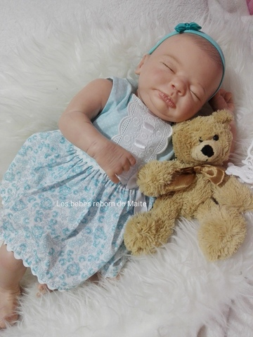 bebes reborn niñas con los ojos cerrados