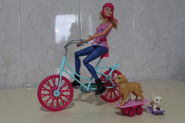 barbie bicicleta con perritos