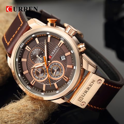 reloj hombre dorado y negro
