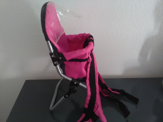 mochila porta muñecas juguettos