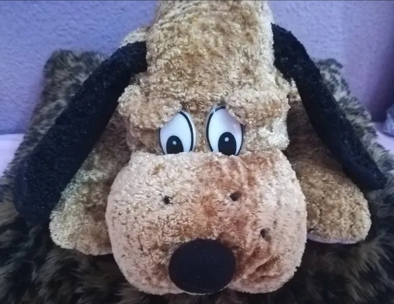 perro triston peluche