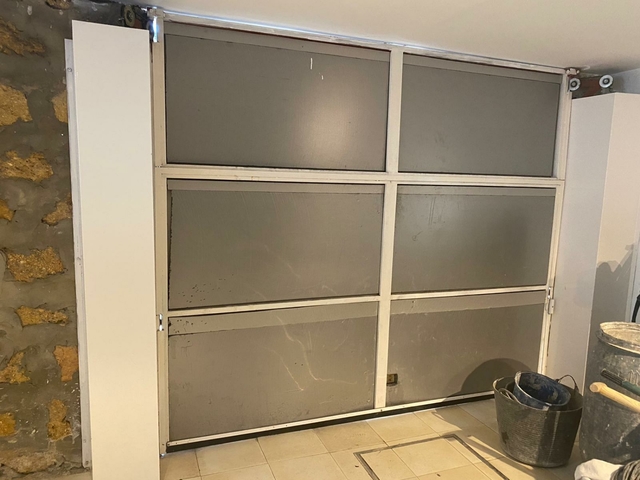 MIL ANUNCIOS.COM - Puerta de garaje plegable seminueva