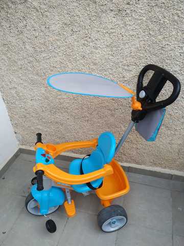 triciclo feber azul y naranja