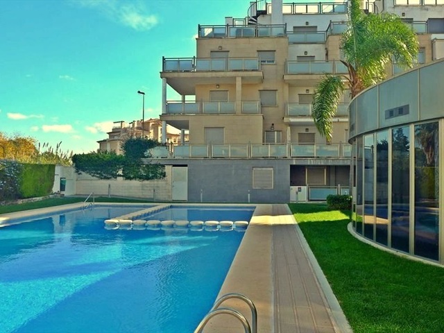 Download Un dormitori condomini de platja de taronja For iPhone Free