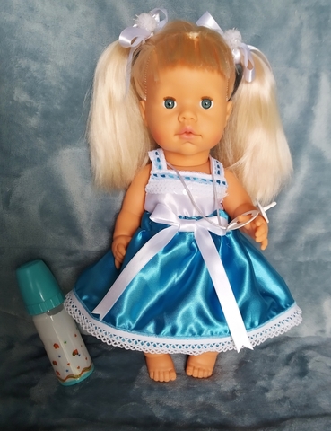 muñeca con chupete y biberon