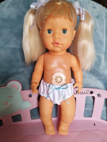muñeca con chupete y biberon