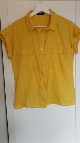 MILANUNCIOS | Camisas y blusas de segunda mano en Asturias Camisa amarilla clara. Talla L de segunda mano por 4 € en El
