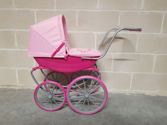 Cochecito para muñeca de madera color rosa de Pintoy Cochecito para muñeca de madera color rosa de Pintoy